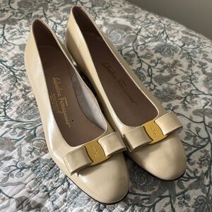 Salvatore Ferragamo Cream Flats with Gold Bow